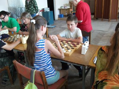 Рязанские шашисты отметили День физкультурника баталиями на чёрно-белых клетках